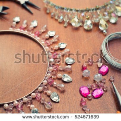stock-photo-the-process-of-creating-jewelry-from-wire-and-crystals-working-tools-on-the-table-handmade-524671639